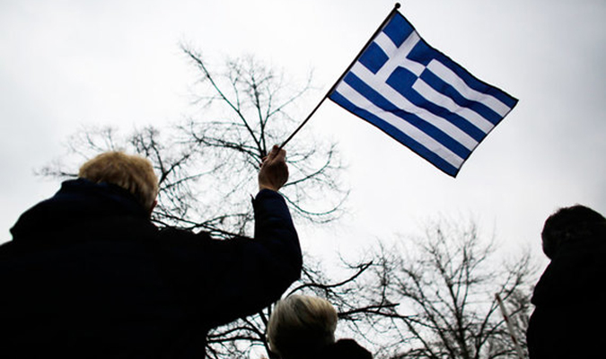Греция начала расплачиваться по долгам